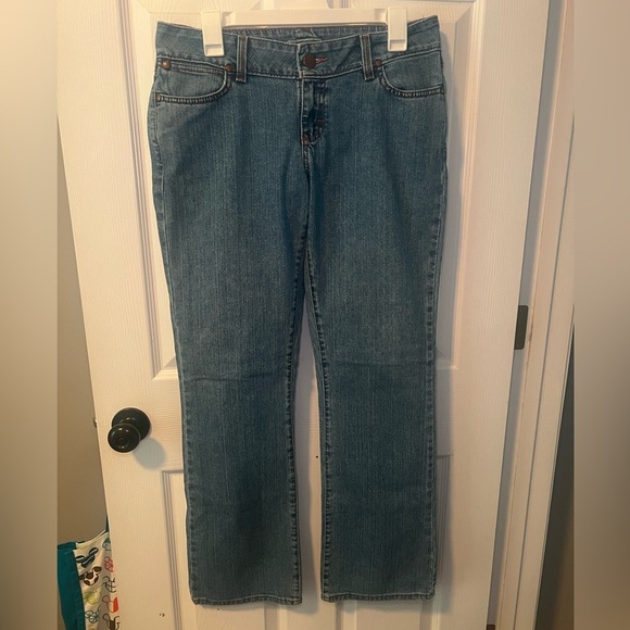 Women’s Wrangler Premium Patch Jeans with pink stitching Size 7/8x32 - Picture 1 of 7